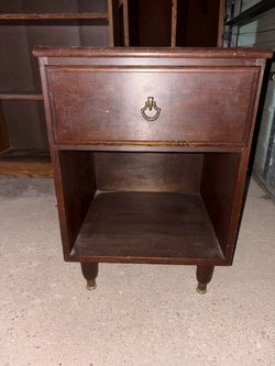 End table with storage bin