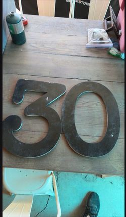 Wooden numbers 3 and 0
