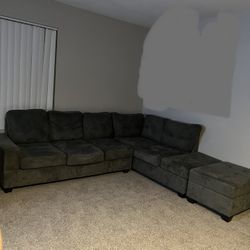 Grey Sectional In Good Conditions 