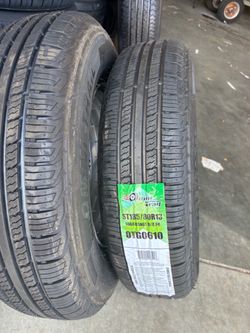 2 trailer tires  with chrome wheel  185x80-13 $180 8 ply heavy duty.  Price firm.