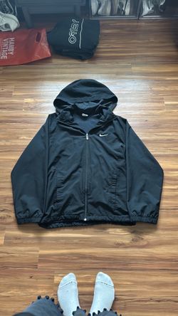 Black Nike rain jacket, size medium