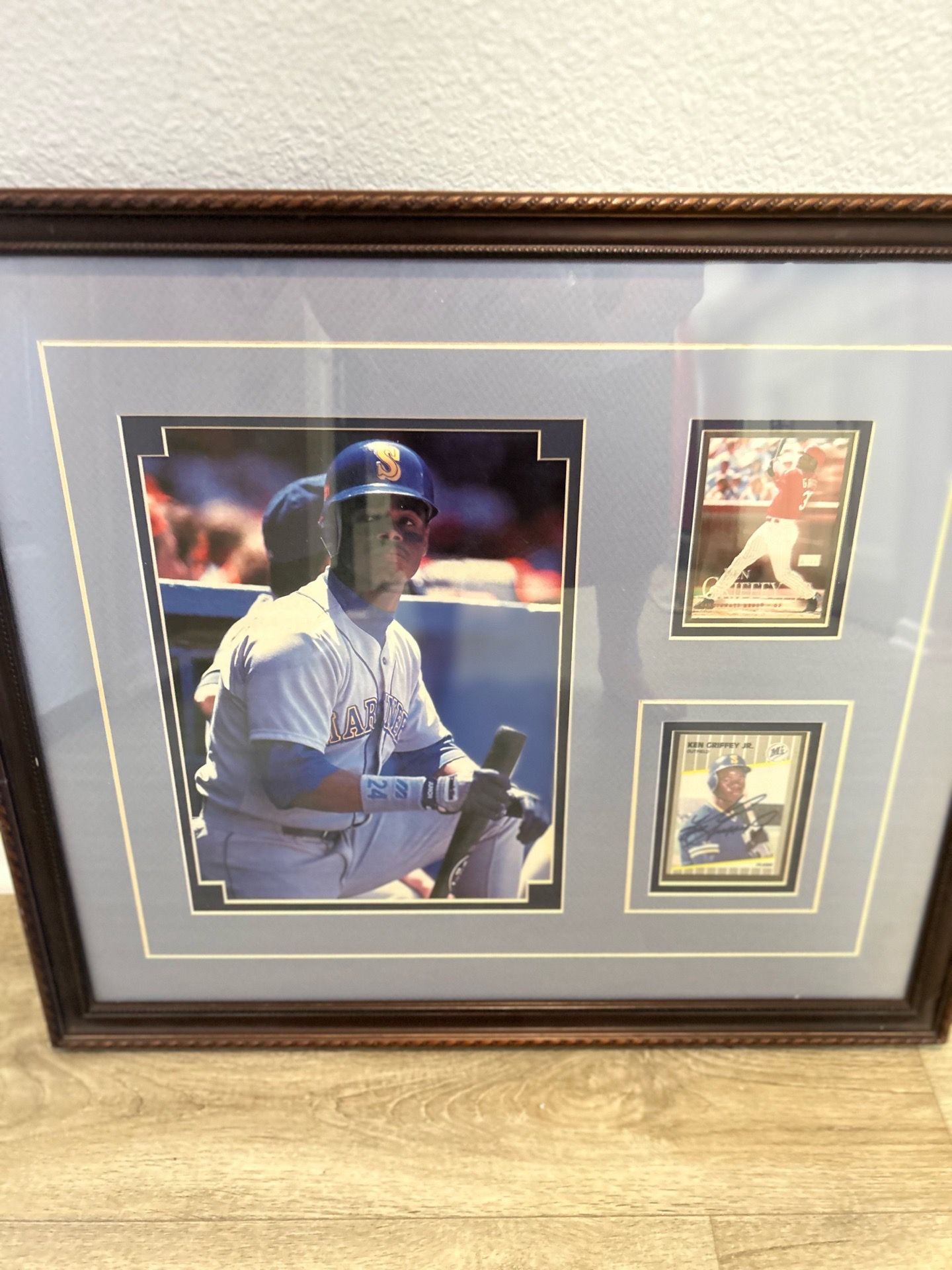 framed Ken Griffey photo and 2 baseball cards.