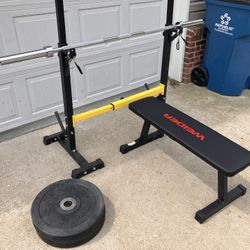 Adjustable Rack With 2 45lb Rubber Bumper Plates And Weirder Bench