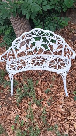 Cast iron bistro table with 2 chairs and bench