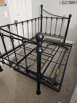 Black bed frame with trundle