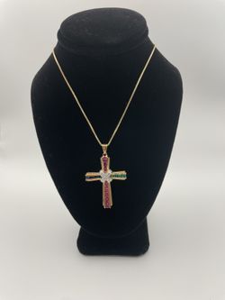 Gold tone cross pendant