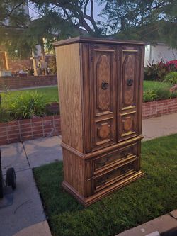 Vintage Wood Armoire with Carved Details