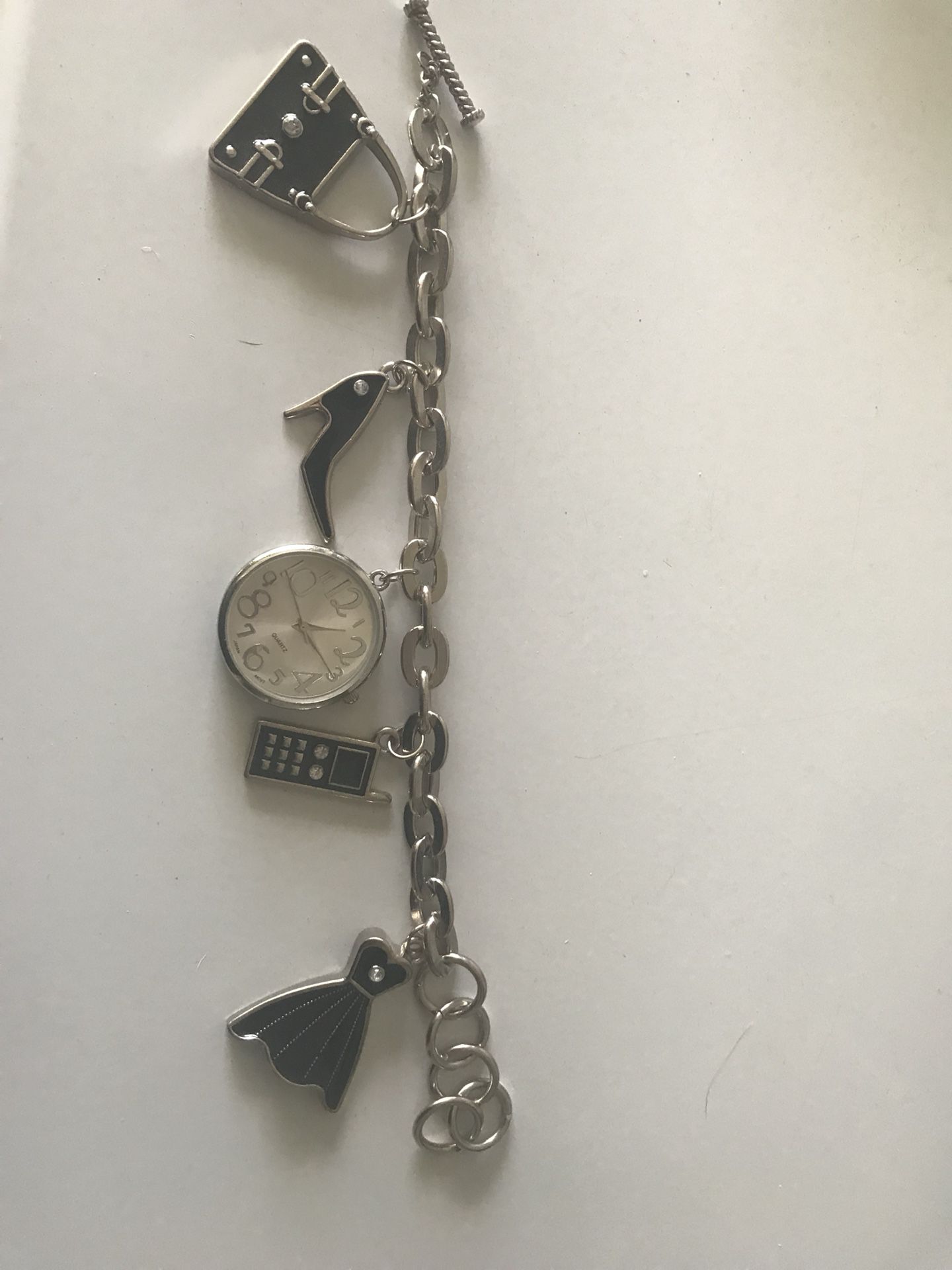 Silver charm bracelet style watch