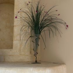 Glass vase with artificial flower