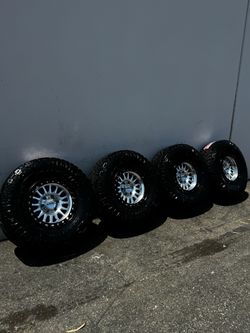 KMC KM552 IMS 6x5.5 Wheels with 35” Nitto Ridge Grappler Tires Machined with Black rings and Chrome Caps