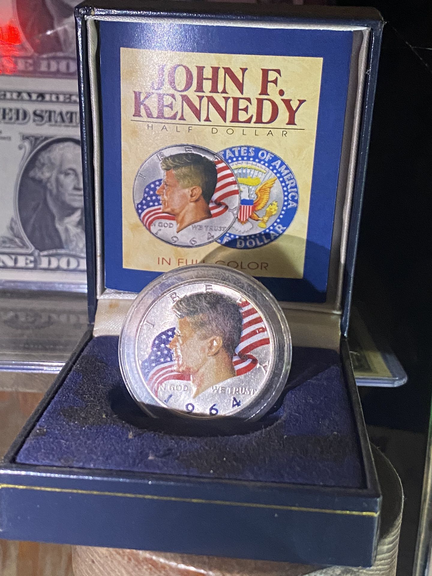 1964 in full color John F Kennedy half dollar with original box and paperwork