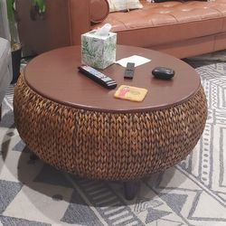 Beautiful dark brown round raffia coffee table with storage