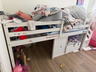 White wooden twin bed