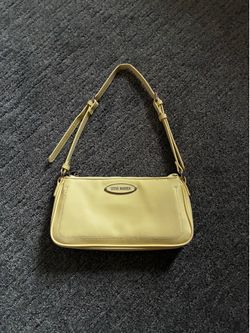 butter yellow steve madden purse
