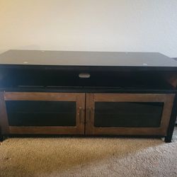 TV Stand Wood & Black Glass Top With 2 Shelves Behind Closed Doors