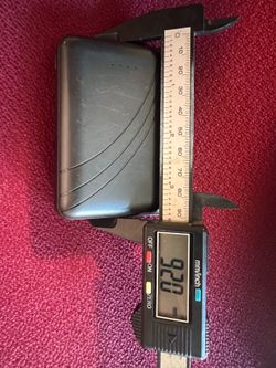 The portable phone charger: Power Bank Model HCT0002 .