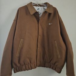 Nike Solo Swoosh Wool Varsity Jacket
Color: Tan Size: XL 