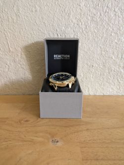 Reaction Kenneth Cole Gold tone Watch with black Band
