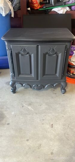 A Heritage Charcoal Gray/Black TopFrench Provincial Nightstand Cabinet
