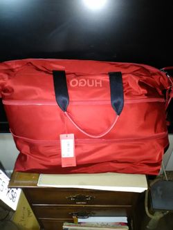 Hugo Boss designer Carry bag. Retails $325.Selling for Best offer