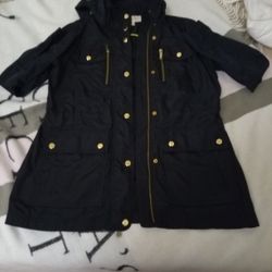 A Woman's Michael Kors Rain Jacket Navy Blue With The Gold Buttons
