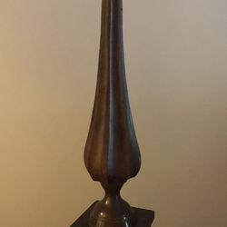Solid metal Decorative piece very heavy bronze color 28” tall
