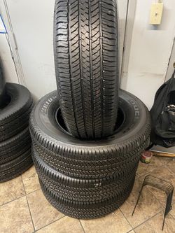 SET 255/70/18 BRIDGESTONE DULER SEMI NEW 95%TREAD LIFE 300 PRICE INCLUDE PROFESSIONAL INSTALLATION AND TAX