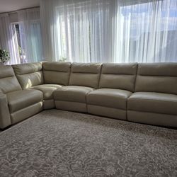 Gabrine 6-Pc. Leather sectional sofas with 5 power Headrests. We bought it at Macy's