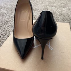 Christian Louboutin  red bottoms