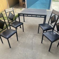 Table And 4 Chairs