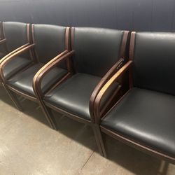 Up For Sale  lot of 5 Wood and Leather Chairs