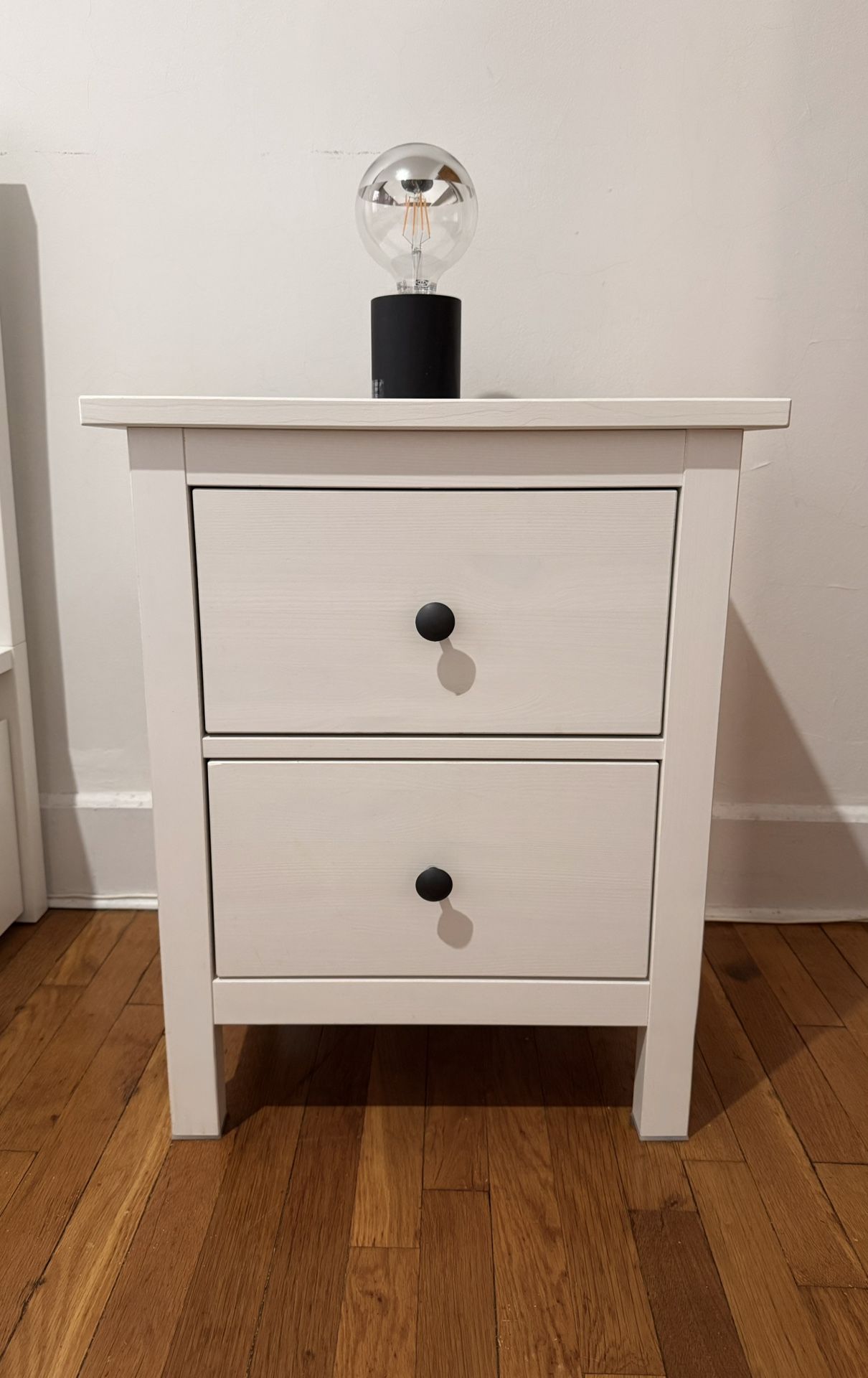 Modern white bedside table with two drawers