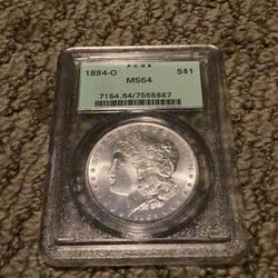 Morgan silver dollar coin graded mint ms64