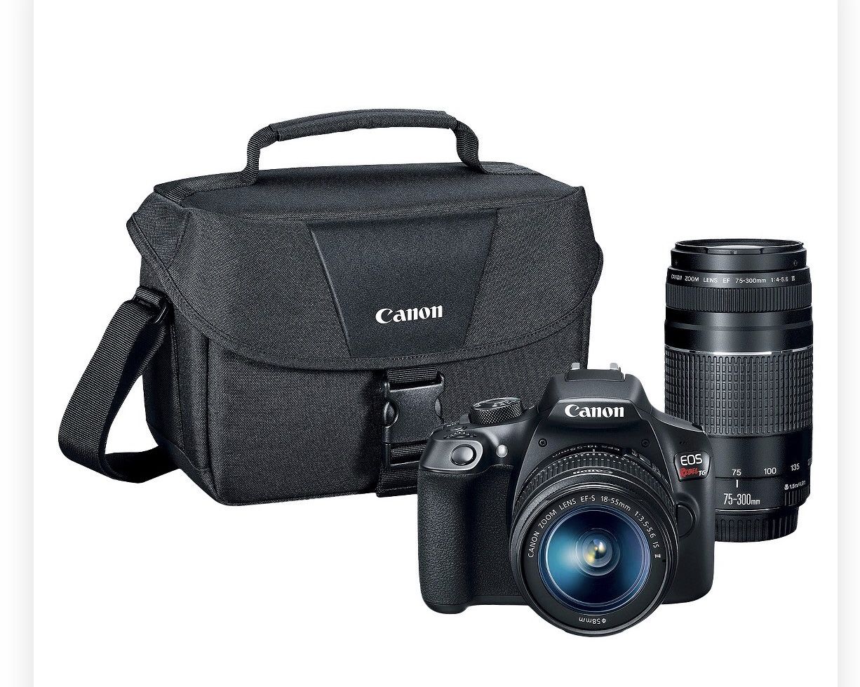 Canon Camera, extra lense, two SD cards and case
