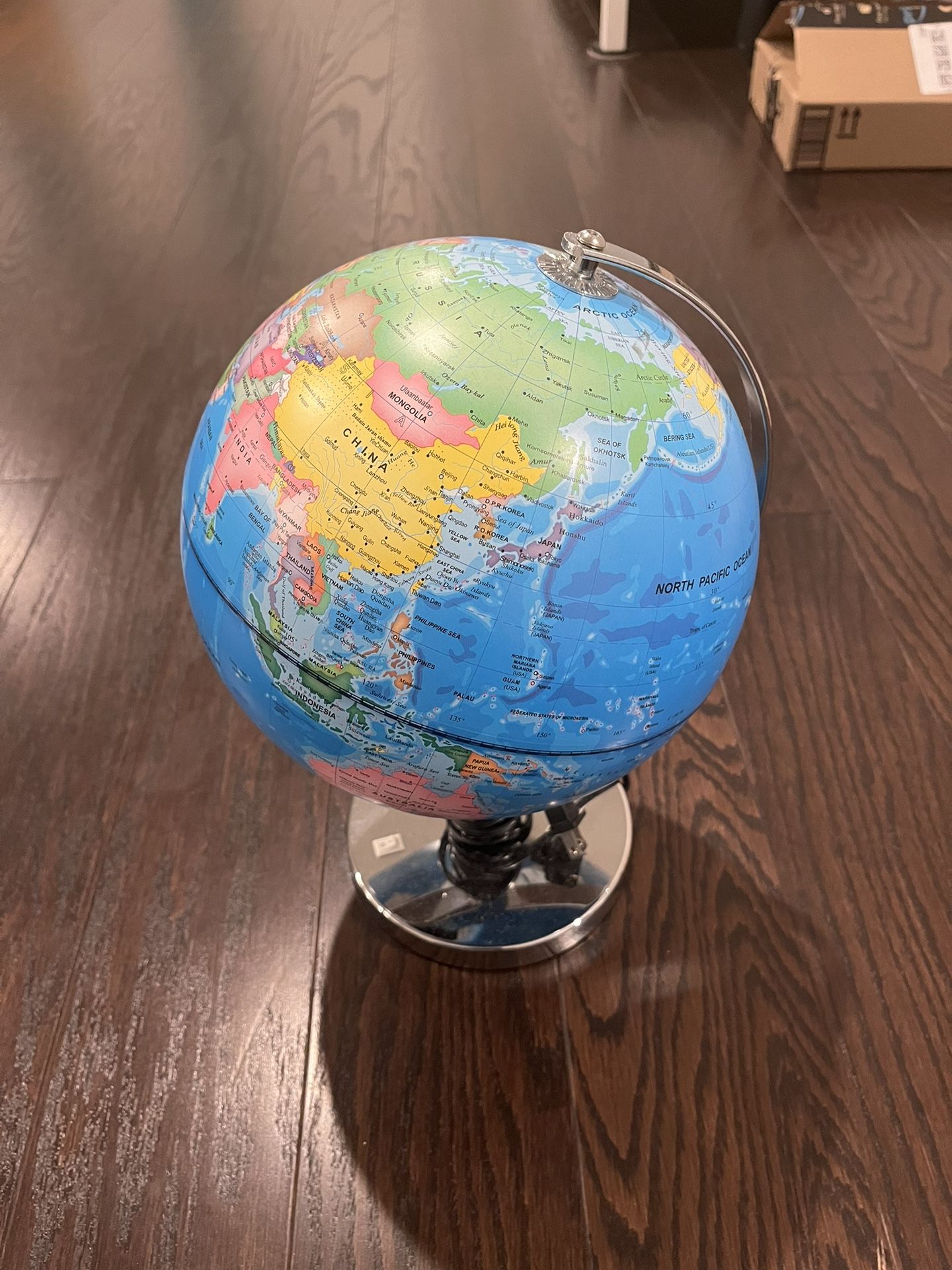 Kids Studying Globe