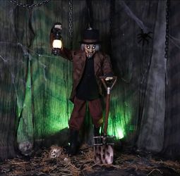 Haunted Living 6-ft Gary the Grave Digger Motion Activated Lighted Animatronic Display Prop.