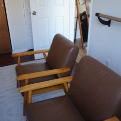 Pair of brown arm chairs