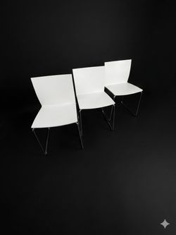 3 modern white chairs