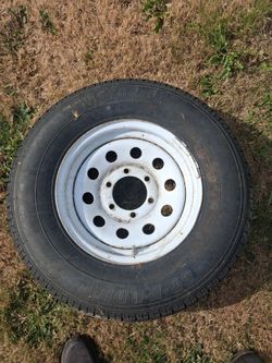 Trailer spare rim and tire