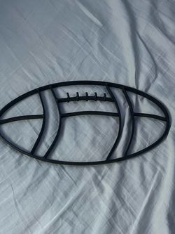 Metal sharped into a football
