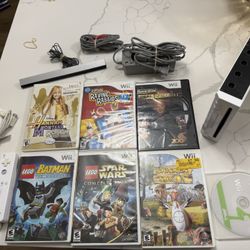 Nintendo Wii Video Game System RVL-001 Console  W/7 Games Cords Lego Rayman  The Nintendo Wii Video Game System RVL-001 Console Bundle is a classic ho