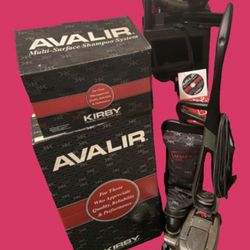 Vacuum Cleaner Brand  Kirby  AVALIR with all attachments, Two Bags, And two bottles, a Floor cleaner