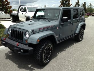 Jeep Wrangler JK Unlimited Authentic Mopar Soft Top 4 Door Black Premium Sunrider Design - Complete Kit