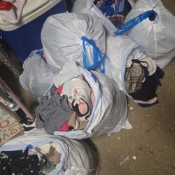 7 Bags Of Clothes- Mens, Womens, And Girls