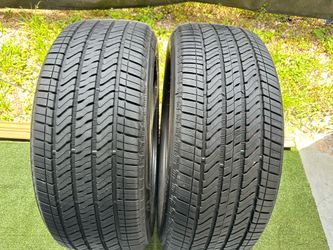 For sale two tires 275/50/22 Bridgestone Alenza Cadillac escalade stock with 90% Left