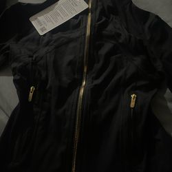 black cropped lululemon define with gold zipper