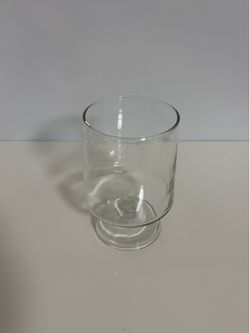 clear glass hurricane-style candle holder