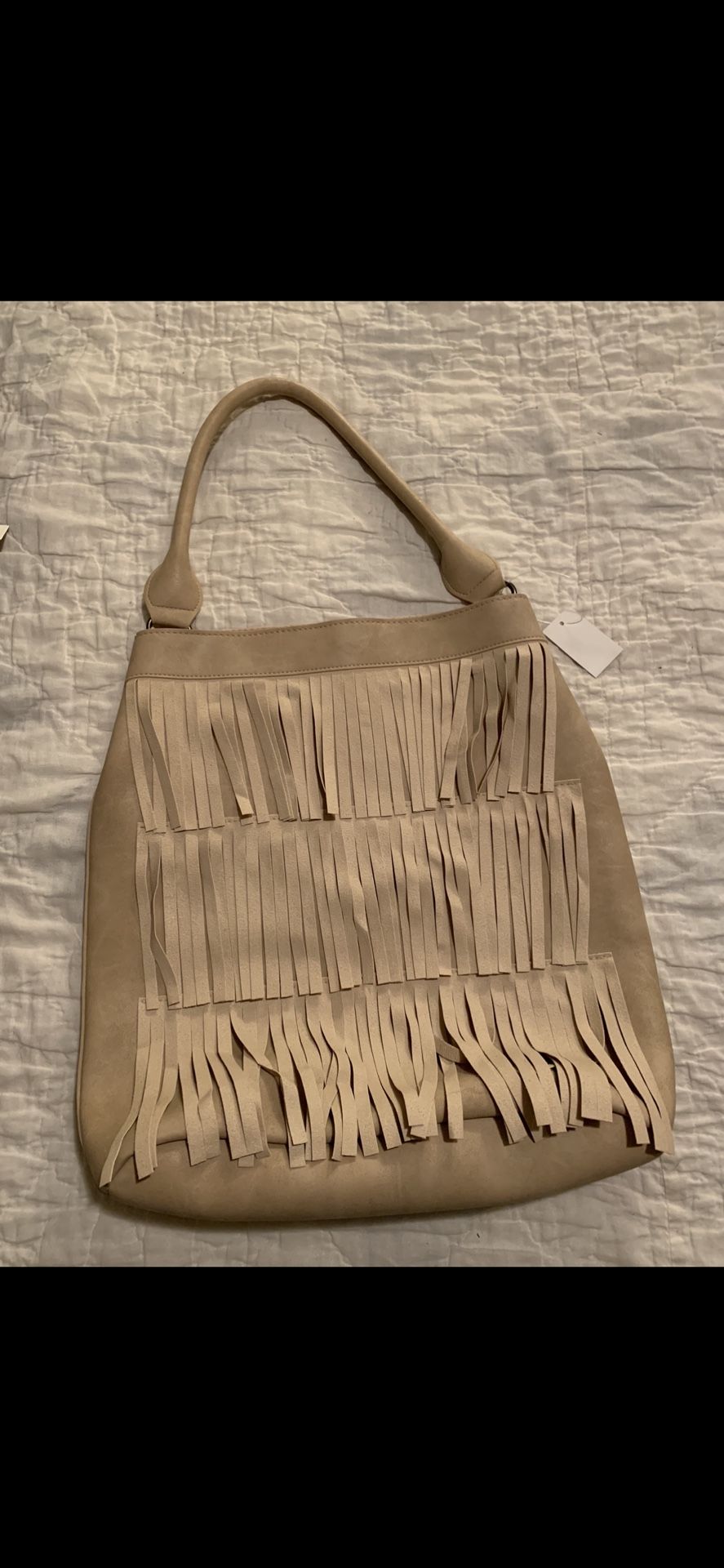 Tan purse from boutique