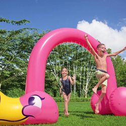Over 6-foot-tall inflatable flamingo arch sprinkler is great summertime fun for adults and kids