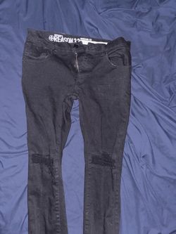 Black ripped jeans size 32